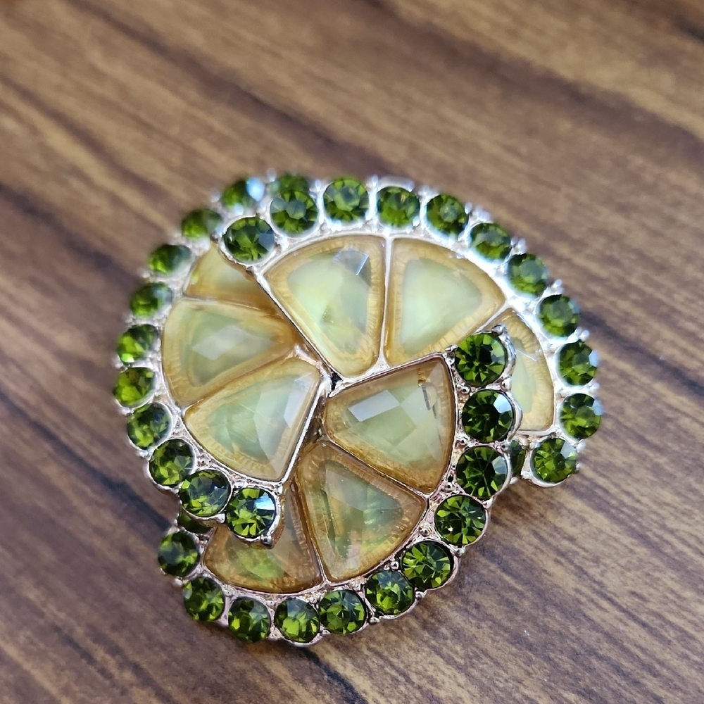 Elegant Green and Gold Jewelry Piece